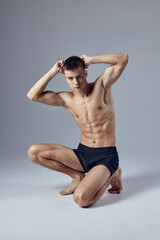 Obraz premium athletic man pumped up body hands behind head emotions lifestyle