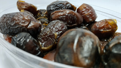 Close up of fresh dates. Dates are a staple food in the Middle East and North Africa, usually eaten during Ramadan for Muslims