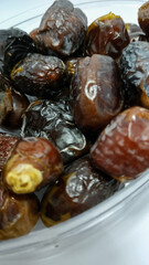 Close up of fresh dates. Dates are a staple food in the Middle East and North Africa, usually eaten during Ramadan for Muslims