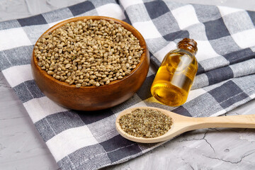 Cannabis flour, seeds, oil in a glass jar. Healthy food from hemp