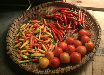 fresh vegetables and seasonings chilies, tomatoes 