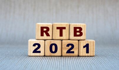 RTB 2021 - word on wooden cubes on a gray background