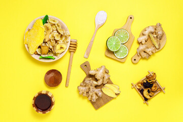 healthy food to boost immune system. Citrus, ginger, honey, dried fruits. Medical nutrition at home. yellow background. Flat lay