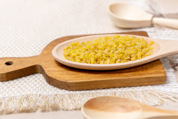 raw bulgur close up, macro. Concept of agriculture. grains of bulgur wheat