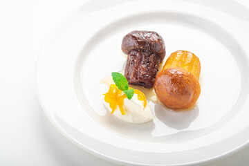 Italian dessert baba from Naples, sweet cake with rum impregnation, close up