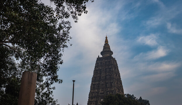 buddhist stupas isolated with bright sky and unique prospective image is taken at mahabodhi temple bodh gaya bihar india. it is the enlightened place of Grate budha and very religious for buddhist.