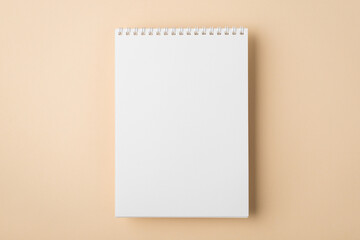 Above overhead close up flat lay mock up view photo of clear spiral notebook with copy space for...