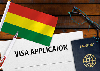 Flag of Bolivia , visa application form and passport on table