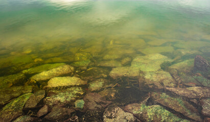river serene clear back water with stone edge