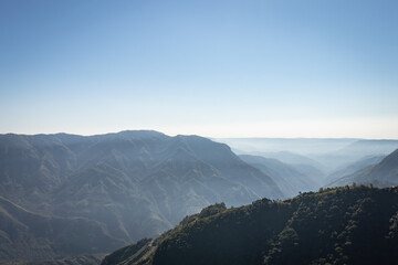 mountain range covered with white mist beautiful landscape