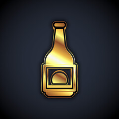 Gold Beer bottle icon isolated on black background. Vector.