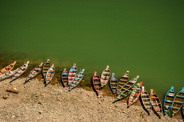 colorful tourist traditional wood boats isolated many at river edge
