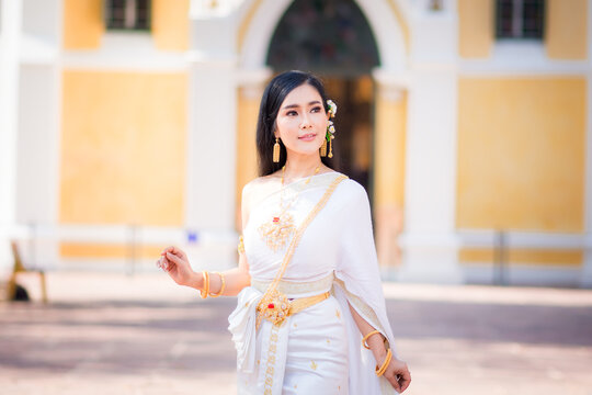 Asian Young women, Portrait of a beautiful thai woman wearing a thai dress,Smile with happiness.