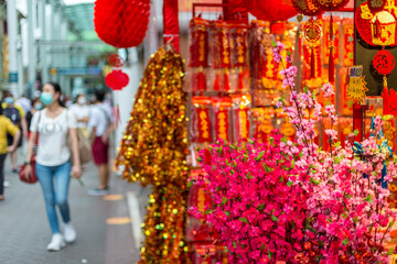 Outdoor Asia Spring Lunar Chinese New Year ornaments decorations. Red is seen as lucky and auspicious by many who believes in traditional customs. Translation:"Spring, Wealth Fortune Good Luck"