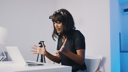 Modern education remote education. Cheerful young african american woman holding online class . High quality photo