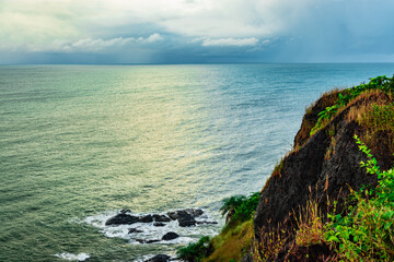 mountain cliff view with sea shore at morning
