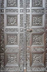 Grandiose metal door with decorations in the center of Timisoara 