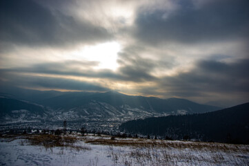 Rural landscape in winter Carpathian mountains