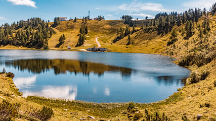 Beautiful alpine summer view with reflections in a lake at the famous Tauplitzalm, Salzkammergut, Steiermark, Austria