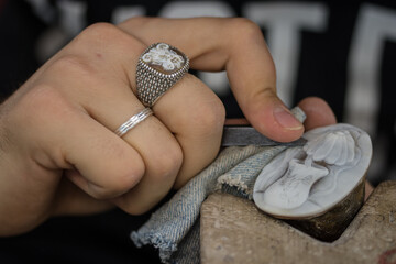 handwork with the mother-of-pearl incision