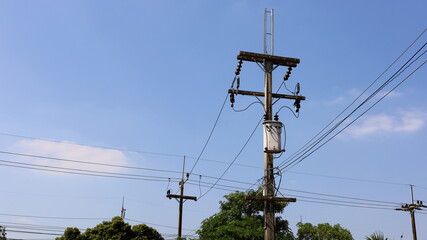Transformer on pole. Single phase transformer with fuse for converting high voltage to low voltage...