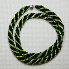 Handmade pearl necklace crocheted from beads
