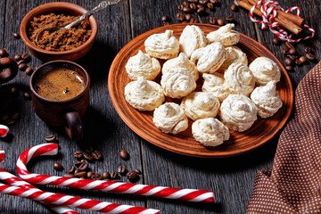 Meringue cookies on a dark wooden background