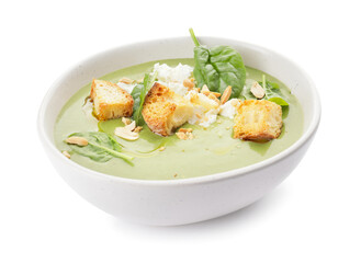 Bowl with tasty spinach soup on white background