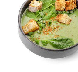 Bowl with tasty spinach soup on white background