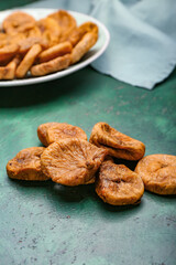 Tasty dried figs on table