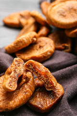 Tasty dried figs on table, closeup