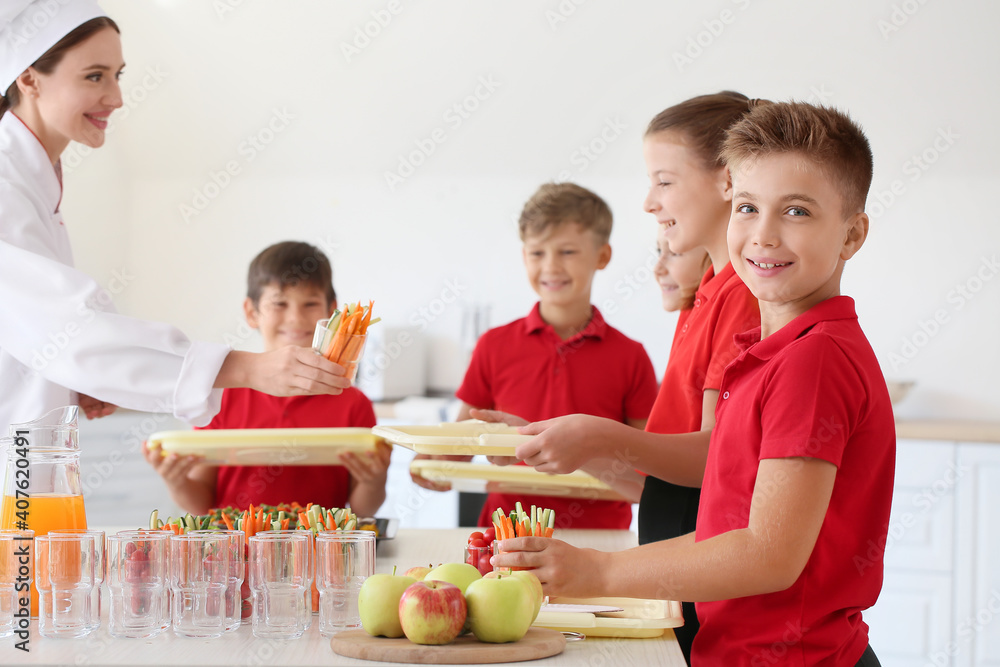 Canvas Prints pupils receiving lunch in school canteen