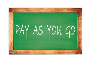 PAY  AS  YOU  GO text written on green school board.