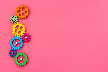 Teamwork concept. Gears connect in working mechanism, overhead view