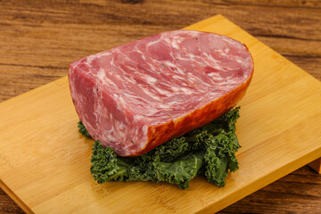 Beef ham piece over board
