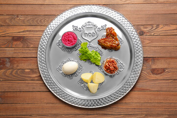 Passover Seder plate with traditional food on table