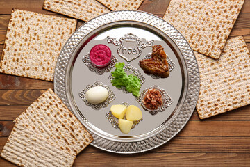 Passover Seder plate with traditional food on table