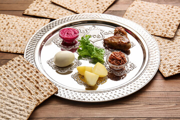 Passover Seder plate with traditional food on table
