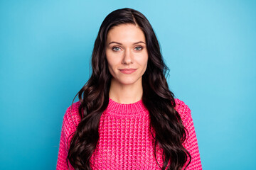 Fototapeta premium Photo of serious charming brunette young woman wear pink pullover isolated on pastel blue color background