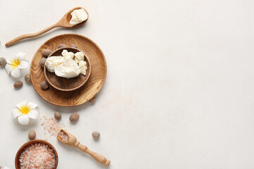 Naklejka na ściany i meble Shea butter with sea salt on light background