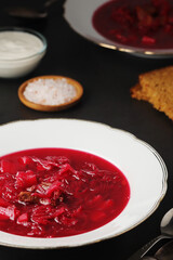 A plate with Ukrainian national dish - borsch