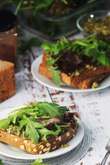 Sandwiches with pesto and green salad