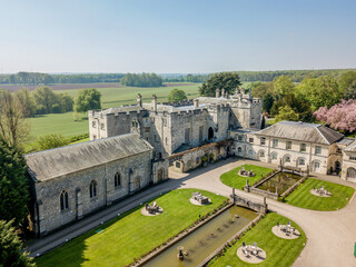 Hazlewood Castle Yorkshire, near York in England in the summer. Aerial view of Hazelwood castle and courtyard on a sunny day. Yorkshire castle wedding venue