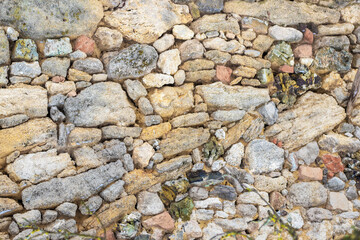 Old masonry wall in an abandoned house