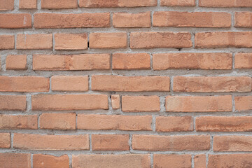 A wall of pink granite briks, perfect for a background