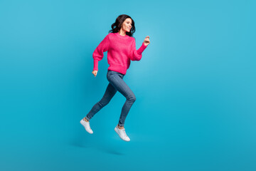 Fototapeta na wymiar Full size profile portrait of pretty lady running jump empty space toothy smile isolated on blue color background