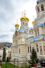 Fototapeta na wymiar 8 apr 2017: Karlovy Vary, Czech republic. Orthodox church with cloudy sky.