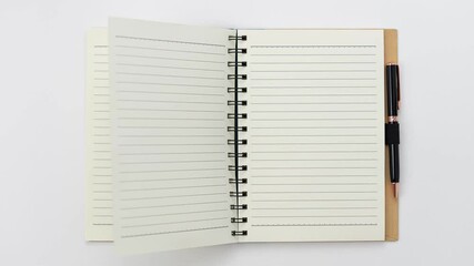 Stop motion animation flip opening empty blank book with text line and black pen in white background