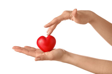 Hands with red heart on white background