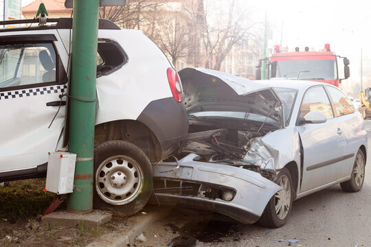 Car crash from car accident on the road in a city, wait insurance